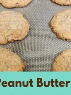 peanut butter cookies on baking sheet with overlay 
