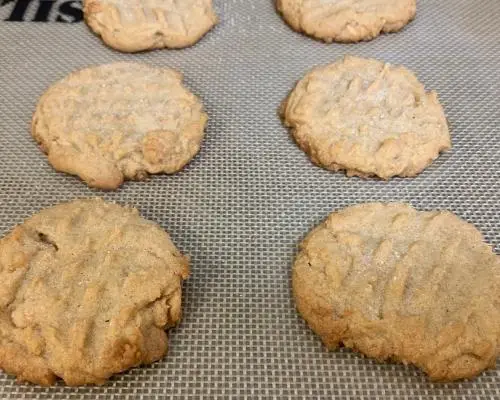 baked peanut butter cookies on baking sheet