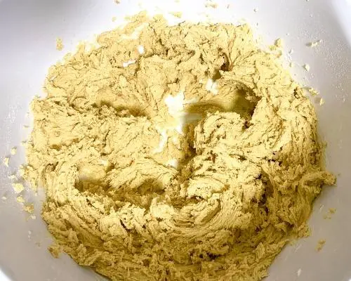 peanut butter cookie dough in white bowl