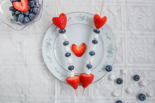 cupid kabobs with strawberries, blueberries, and marshmallows