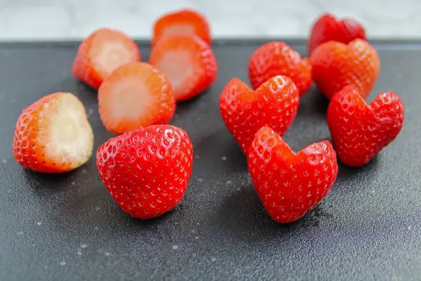 heart shaped strawberries on counter